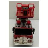 Two Vintage Plastic Fire Trucks Including Nylint 16" And One Battery Operated 20"