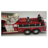 Two Vintage Plastic Fire Trucks Including Nylint 16" And One Battery Operated 20"