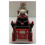 Two Vintage Plastic Fire Trucks Including Nylint 16" And One Battery Operated 20"