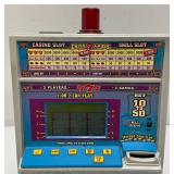 Miniature Criss 7 Cross Slot Machine Battery Operated 6" x 7 1/2" x 12 1/2" (Untested) And Casino Wheel With Original Box