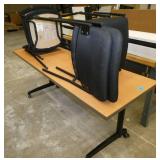 One 72x24 Flip-top table on wheels and 4 chairs