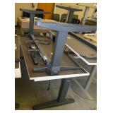Two Steelcase electric adjustable height tables/desks