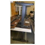 Two Steelcase electric adjustable height tables/desks