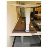 White 80x24 table and Steelcase Woodgrain 78x30 both electric adjustable height tables