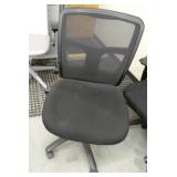 3 black chairs of various type