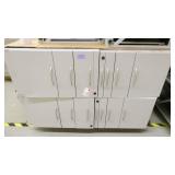 Four file cabinets (top is open)