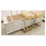 Pallet of table tops , most are 24x90