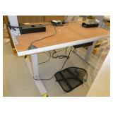 Two 24x48 adjustable height tables