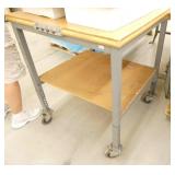 Two fire extinguisher cabinets and rolling warehouse table 30x30