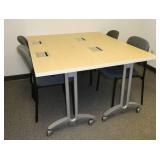 Two powered tables and 4 chairs