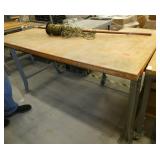 72x36 Workbench with wood top and steel legs, and a roll of speaker wire