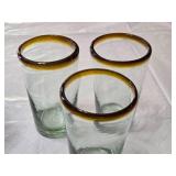 Set of Drinking Glasses Including Blue Striped and Amber-Rimmed Designs