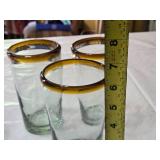 Set of Drinking Glasses Including Blue Striped and Amber-Rimmed Designs