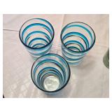 Set of Drinking Glasses Including Blue Striped and Amber-Rimmed Designs