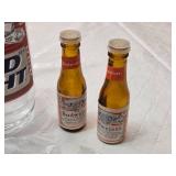 Budweiser and Bud Light Collectible includes a Bud Light glass, two miniature Budweiser bottles, and Bud-themed beaded necklaces in red and blue