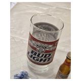Budweiser and Bud Light Collectible includes a Bud Light glass, two miniature Budweiser bottles, and Bud-themed beaded necklaces in red and blue
