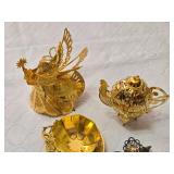 Gold and Silver Decorative Figurines and Jewelry Set including Angel Figurine, Peacock Teapot, and Brooch