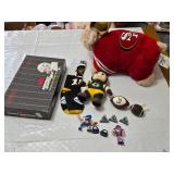 Assorted NFL Memorabilia including Armchair Quarterback Board Game (uncounted), 49ers Plush Toy, and Various Collectible Figurines