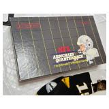 Assorted NFL Memorabilia including Armchair Quarterback Board Game (uncounted), 49ers Plush Toy, and Various Collectible Figurines