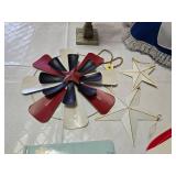 Patriotic Decor and Toy Lot Including Metal Stars, Dolls, and Paddle Games