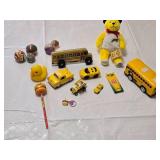 Yellow toy vehicle and accessory set including Parker Store Miniature Race Car, Burger King Crayola Crayon Box, and Assorted Toy Balls