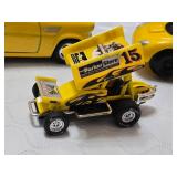Yellow toy vehicle and accessory set including Parker Store Miniature Race Car, Burger King Crayola Crayon Box, and Assorted Toy Balls