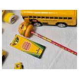 Yellow toy vehicle and accessory set including Parker Store Miniature Race Car, Burger King Crayola Crayon Box, and Assorted Toy Balls