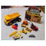 Toy Construction Vehicles and Accessories Lot including CAT Dump Truck, Orange Rescue Vehicle, and Big Bulldozer Book