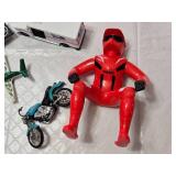 Assorted Toy Vehicles and Figure Set including Motorbike, Helicopter, Plane, Boat, USPS Van, and Red Yamaha Figure