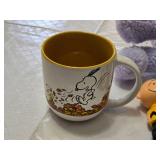 Peanuts Character Toys and Mug Set featuring Snoopy, Charlie Brown, and Woodstock