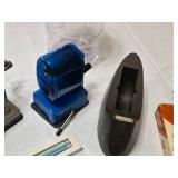 Office supplies including Bostitch Air Pencil Sharpener, Scotch Tape Dispenser, and More