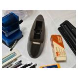 Office supplies including Bostitch Air Pencil Sharpener, Scotch Tape Dispenser, and More