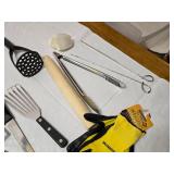 Assorted Kitchen and Household Items including Kitchen Tools, Extension Cords, and Gloves