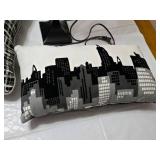 Black and White Table Lamp, Pillows with Cityscape and Geometric Patterns