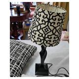Black and White Table Lamp, Pillows with Cityscape and Geometric Patterns