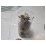 Collection of Seashells and Rocks in Glass Jars