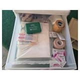 First Aid Supplies and Plastic Drawers