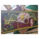 Box of Christmas Decorations including Welcome and Noel Signs, Snowman Themed Decorations, and Festive Flags