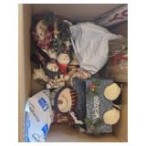 Box of Christmas Decorations including Welcome and Noel Signs, Snowman Themed Decorations, and Festive Flags