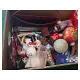 Box of assorted holiday decorations and ornaments