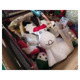 Box of assorted holiday decorations and ornaments