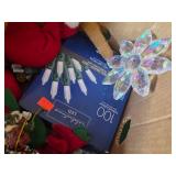 Box of assorted holiday decorations and ornaments