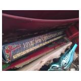 Box of assorted holiday decorations and ornaments