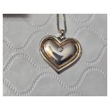 My Daughter, My Joy Diamond Pendant by Bradford Exchange crafted from solid sterling silver with 24-karat gold accents and a genuine faceted diamond