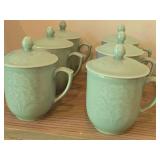 (7) Celadon Peony Embossed Sky Blue Porcelain Lidded Tea Cups + (1) Tea Cup with Crane Design