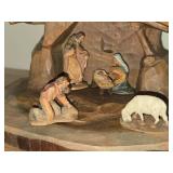 (4) Handcarved Wooden Folk Art Figurines + 5-piece Handcarved Wooden Figurines in a Nativity Scene