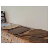 (2) Wood Cutting Boards, (1) Ceramic Cutting Board, (2) Wood Serving Trays