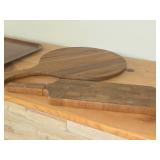 (2) Wood Cutting Boards, (1) Ceramic Cutting Board, (2) Wood Serving Trays