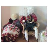 (4) Santa Head Ornaments, (1) Snowman Door Know Hanger, (1) Santa in a Chair Figure