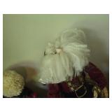 (4) Santa Head Ornaments, (1) Snowman Door Know Hanger, (1) Santa in a Chair Figure
